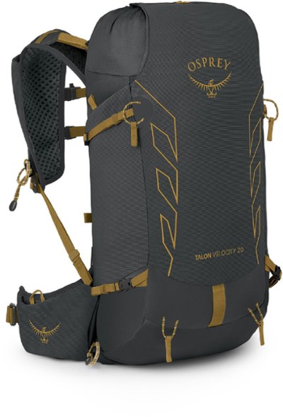 Side view of Osprey Talon Velocity 20 lightweight backpack showing flexible harness and compression straps