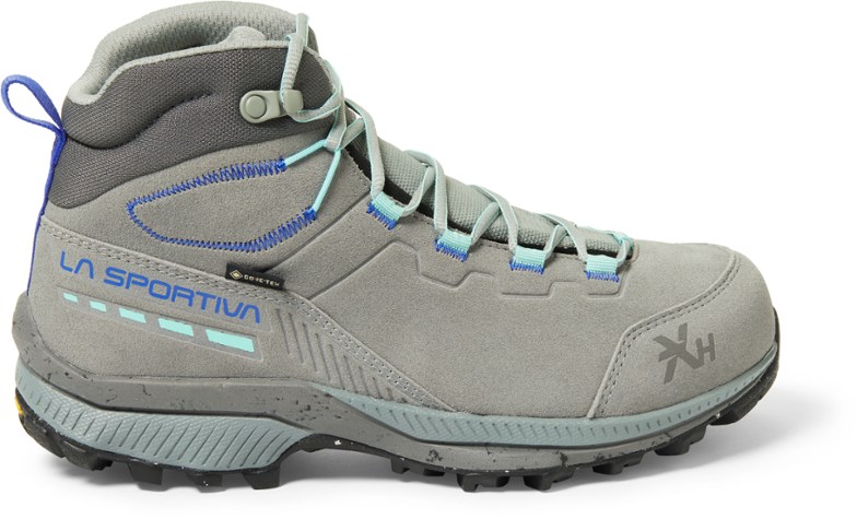 La Sportiva TX Hike Mid GTX hiking boots showcasing their durable nubuck leather and grippy Vibram outsoles.