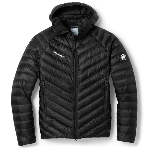 Mammut Broad Peak Down Jacket on a climber in snowy terrain, showcasing its warmth and packability.