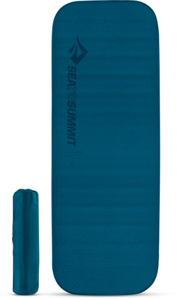 Comfort Elite Self-Inflating Camping Mattress in natural outdoor setting.