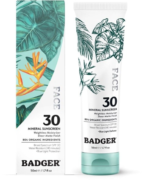 Sheer-Matte SPF 30 Mineral Sunscreen in a natural setting, showing its application on skin.