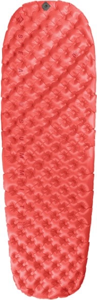 Women's Ultralight Insulated Air Sleeping Pad in a tent setup, showcasing its compact design.
