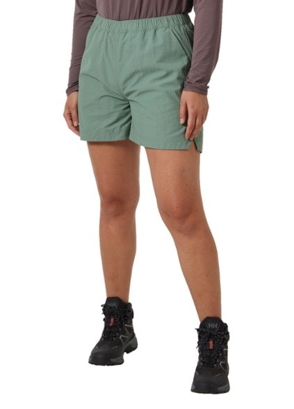 Vetta women's hiking shorts in a natural outdoor setting, showcasing the quick-dry fabric and elastic waistband.