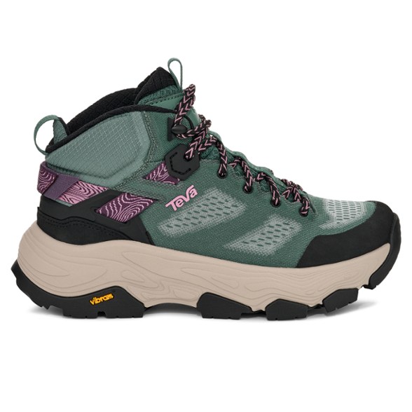 Close-up of Teva Grandview Max Vent Hiking Boots on rocky terrain, highlighting the breathable mesh and sturdy design.