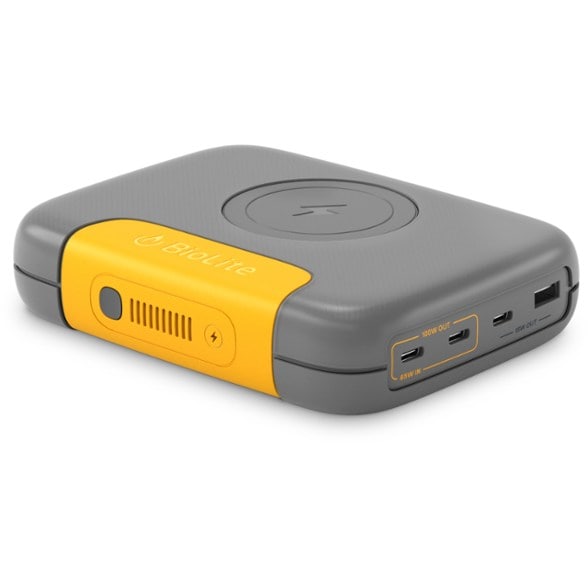 ChargeMax Pro 25000 Wireless Power Bank showing multiple devices charging simultaneously.
