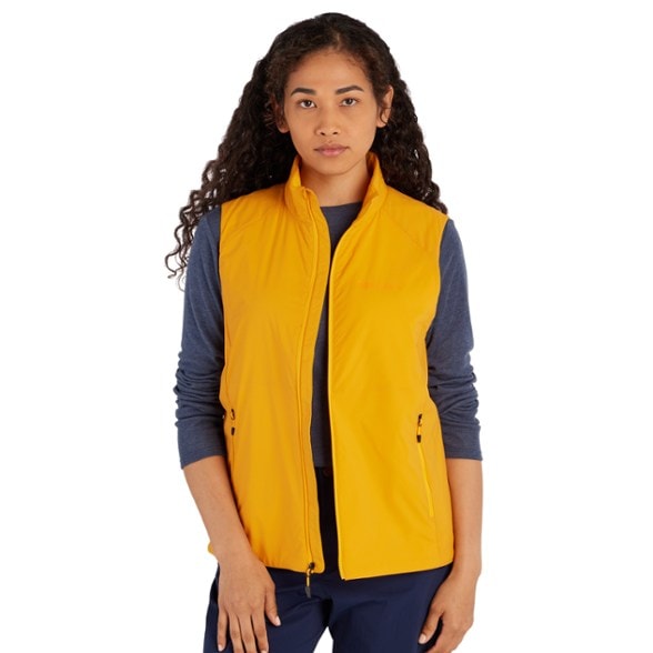 Front view of the women's insulated vest showcasing its stylish design and zippered pockets.