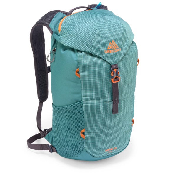 Gregory Nano 18 H2O hydration pack shown in use on a mountain trail, featuring a sleek design and water reservoir.