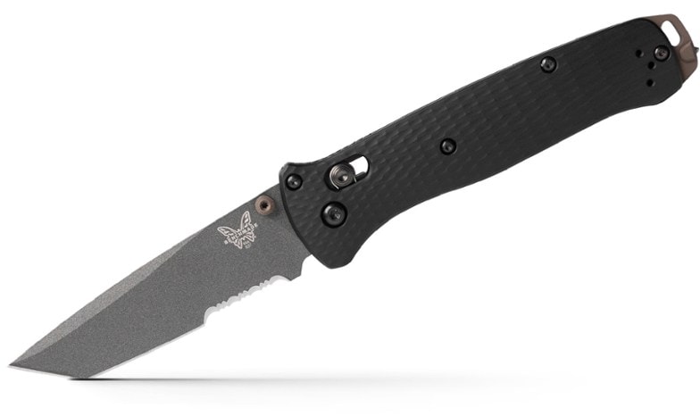 Benchmade 537SGY-03 Tactical Serrated Knife at an outdoor campsite, ready for use.