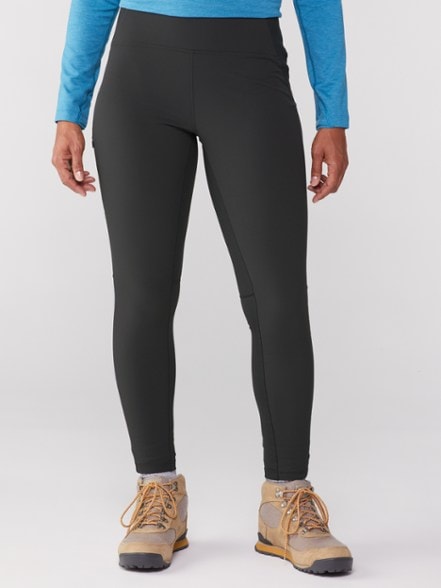 Mountain Hardwear Women's Climbing Tights showcasing flexibility and style on a hiking trail.