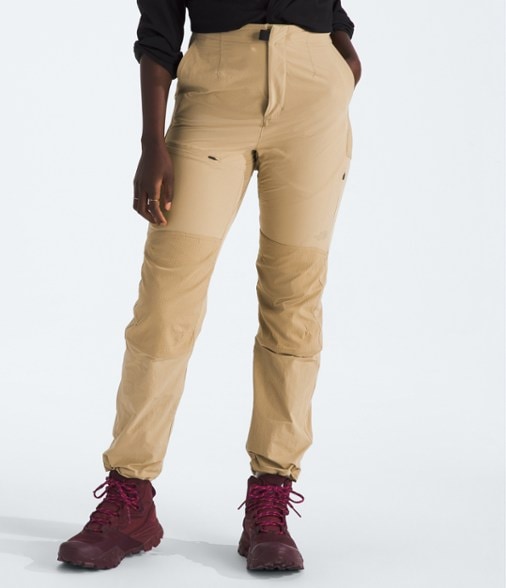 Side view of Trailblazer Women's Hiking Pants in action on a hiking trail.