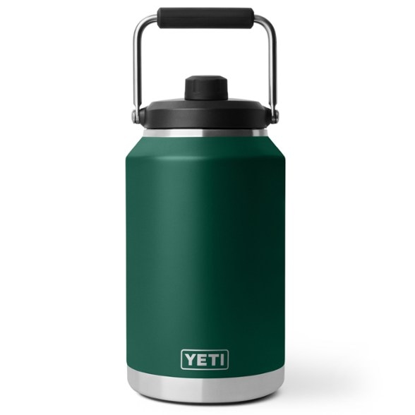 YETI Rambler Insulated One-Gallon Jug in use at a campsite.