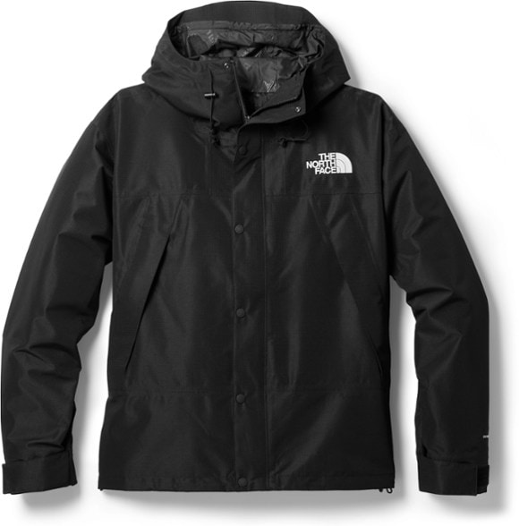 EcoShield Men's Recycled Waterproof Mountain Jacket displayed in a forest setting, emphasizing its eco-friendly design.