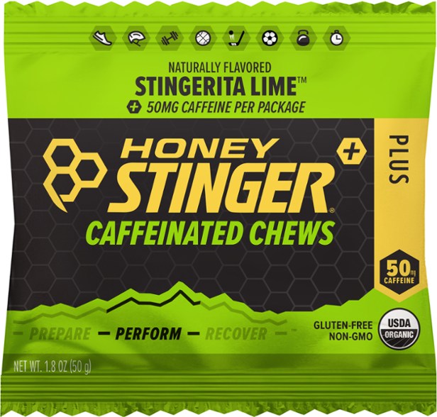 Honey Stinger Energy Chews Cherry Cola flavor in a sporty setting, ideal for workouts.