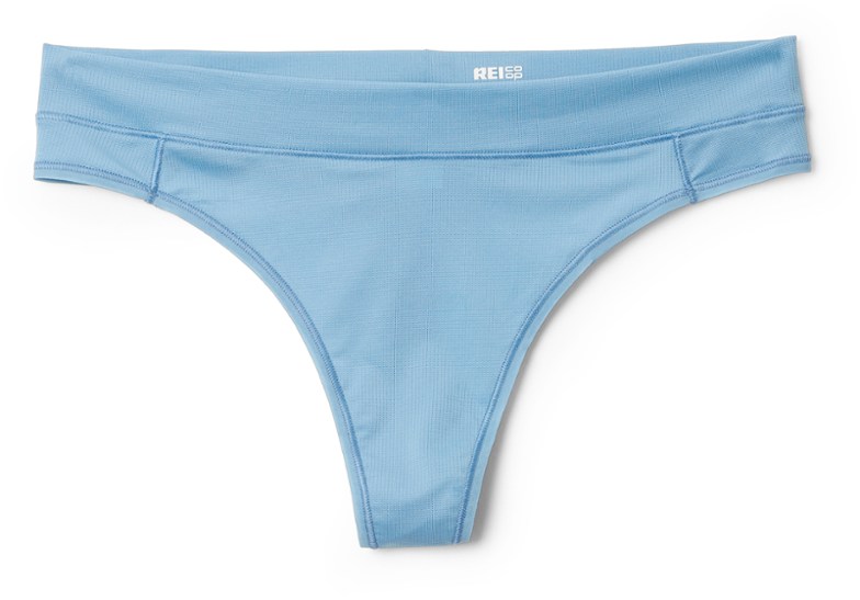 Front view of ultra-soft women's active thong underwear in a natural setting.