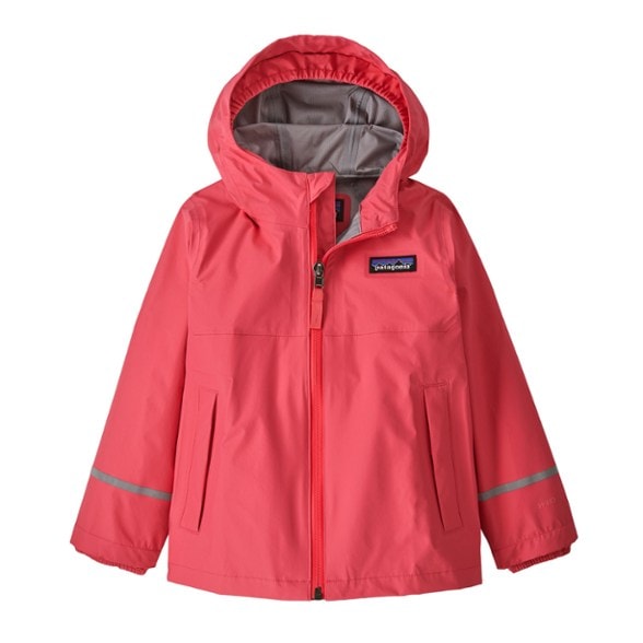 RainGuard toddler jacket in action during a rainy day outing, showcasing its waterproof features.