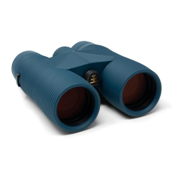Close-up view of Nocs Provisions 8x42 waterproof binoculars in a natural setting.