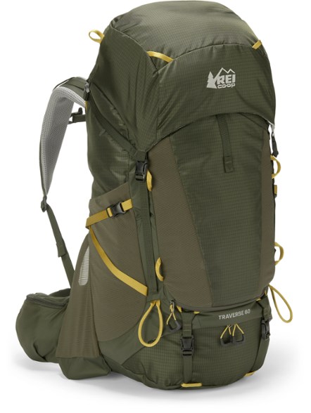 Traverse Pro 60 Men's Hiking Backpack in action on a mountain trail, emphasizing its ergonomic design.