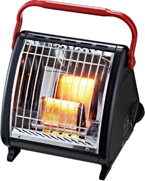 Kovea Portable Heater set up at a campsite, surrounded by camping gear.