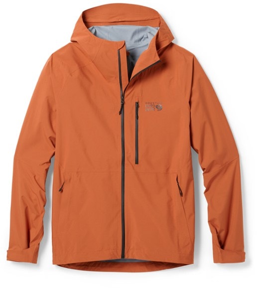Men's Stretch Ozonic Packable Rain Jacket in action on the hiking trail, showcasing its waterproof features.