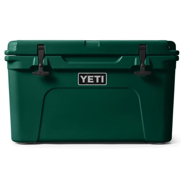 YETI Tundra 45 cooler in a camping setting, showcasing its rugged design and insulation features.