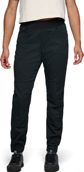 High-waisted climbing pants for women, showcasing the elastic waistband and articulated knees.