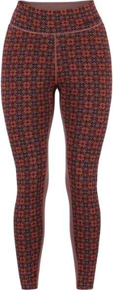 Front view of model wearing lightweight merino wool leggings with high waist, ideal for skiing
