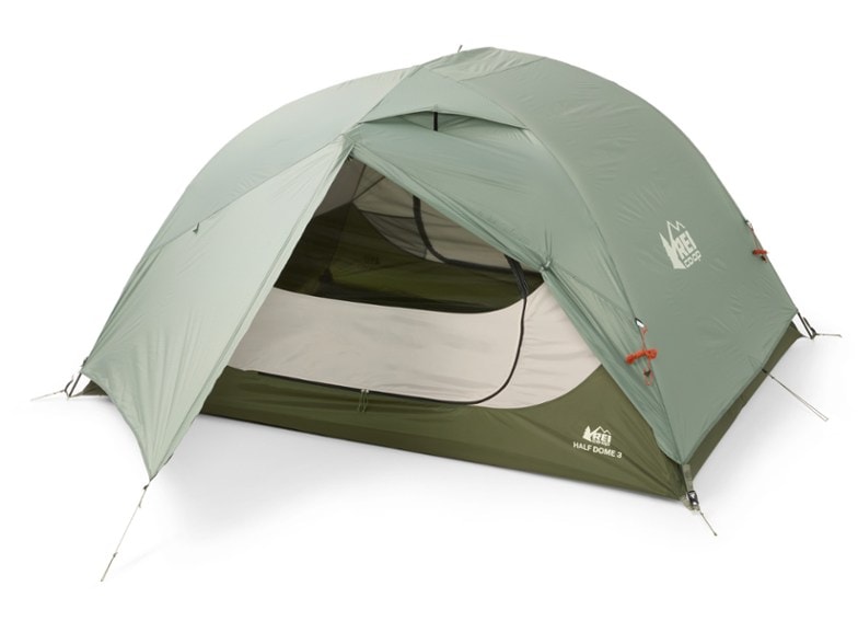 Adventure Ready 3-person tent set up on a campsite with a scenic mountain view.