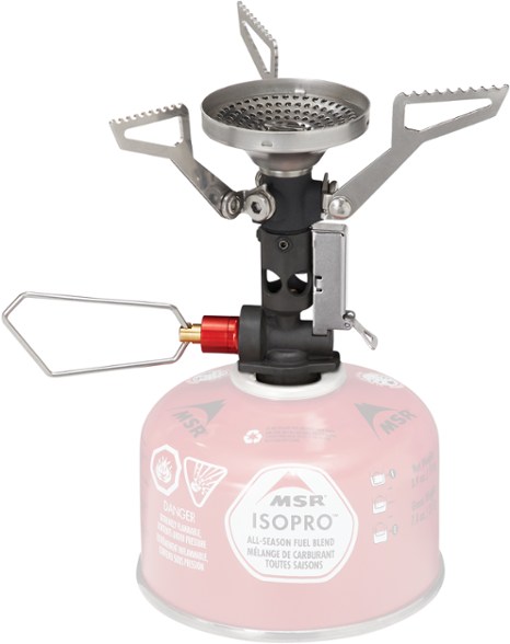 Side view of the PocketRocket Deluxe ultralight stove showcasing its compact design and broad burner head