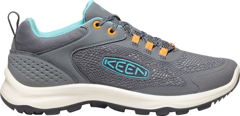 Side view of KEEN Terradora Speed lightweight hiking shoes on a rocky trail.