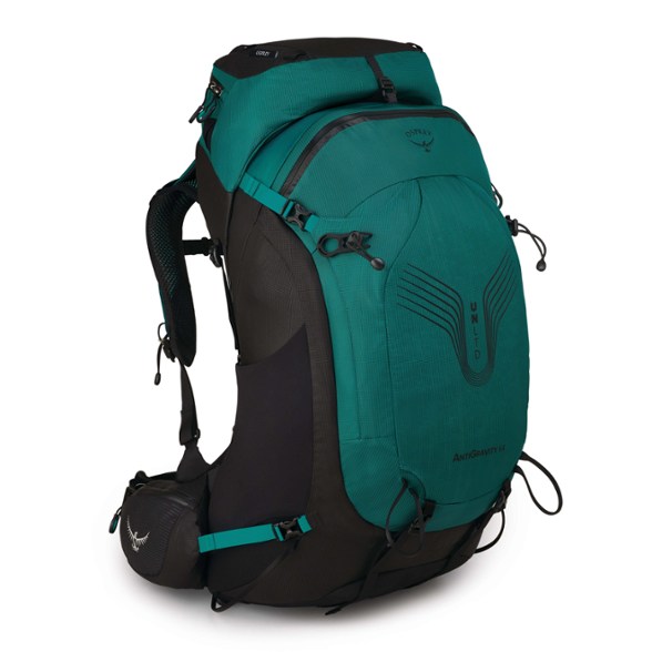 Osprey UNLTD Antigravity 64 Women's Backpack in forest setting, showcasing its sleek design.