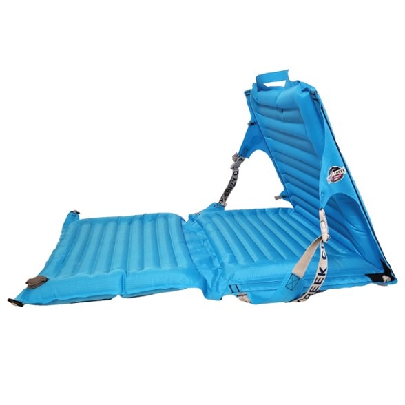 Side view of the AirLounger Portable Lounge Chair set up in a campsite, highlighting the 3-panel design.
