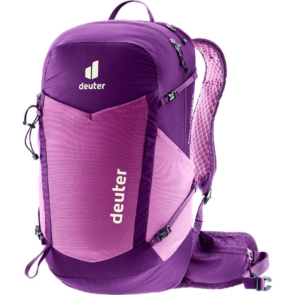 Deuter Women's Speed Lite Pro 23 SL backpack in use on a mountain trail.