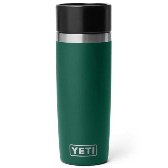 Rambler Elite vacuum insulated travel bottle with leakproof commuter cap shown upright on wooden table, perfect travel bottle for daily commute