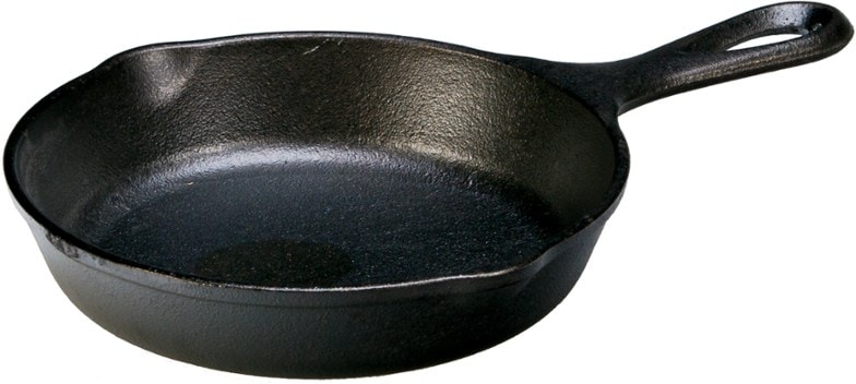 Lodge 6.5-inch cast iron skillet on a campfire grill