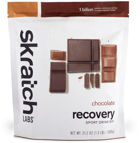 Close-up of EnduraFuel protein recovery drink mix powder with visible natural whey and casein proteins