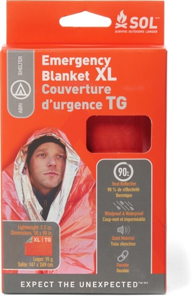 Large emergency blanket for adults in bright orange, fully unfolded showing size
