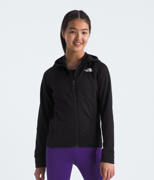 Front view of the recycled kids full zip hoodie in action during a hike.