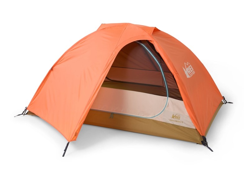 Front view of the REI Co-op Trailmade 2-Person Tent set up in a forest area, highlighting its freestanding structure.