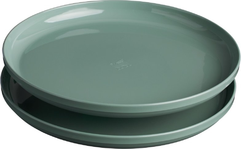 Top view of stacked BPA-free camping plates with high walls, placed on a picnic table