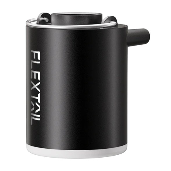 Side view of GlowAir Lantern Pump inflating an air mattress outdoors using inflatable mattress pump for outdoor use