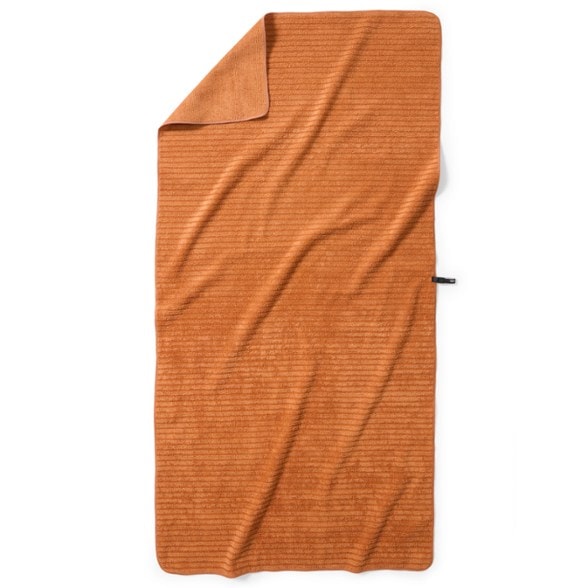 Eco-Friendly Superabsorbent Camping Towel hanging to dry in a sunny campsite
