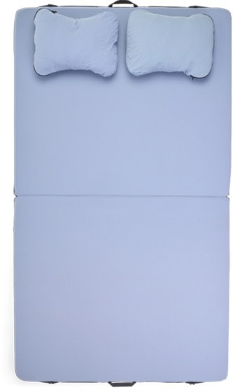 Dually Comfort camping pad in a roof-top tent, showcasing its plush memory foam layers.