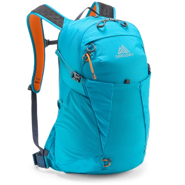 Gregory Kiro 24 daypack displayed on a rocky trail, highlighting its sleek design and comfort features.