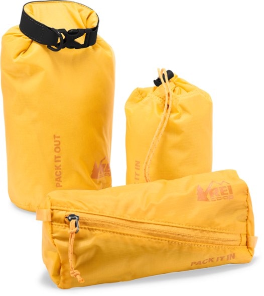Eco-Friendly Pack In Pack Out Pouch Set displayed outdoors