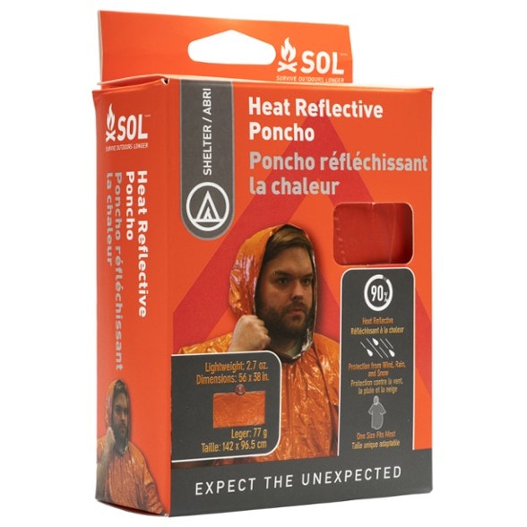 UltraShield Heat-Reflective Poncho showcasing its lightweight design in a hiking setting.