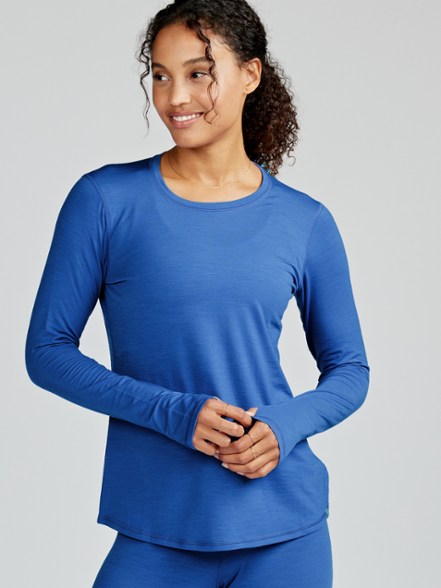 Elevation Women's Merino Performance T-Shirt showing moisture-wicking properties during a run