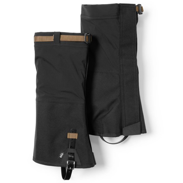 Close-up side view of SummitShield waterproof gaiters wrapped securely around hiking boots, ideal for snowy trail use.