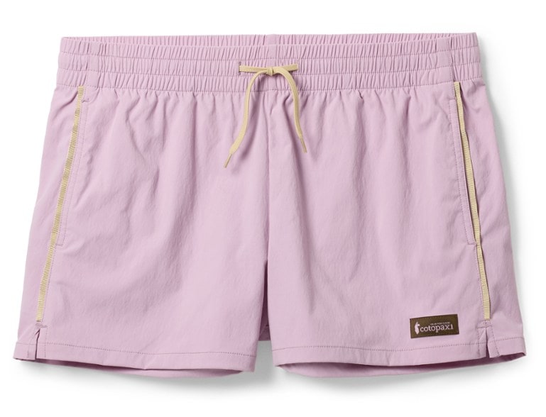 Cotopaxi Women's Brinco Hiking Shorts in action during a hike, showcasing flexibility and retro design.