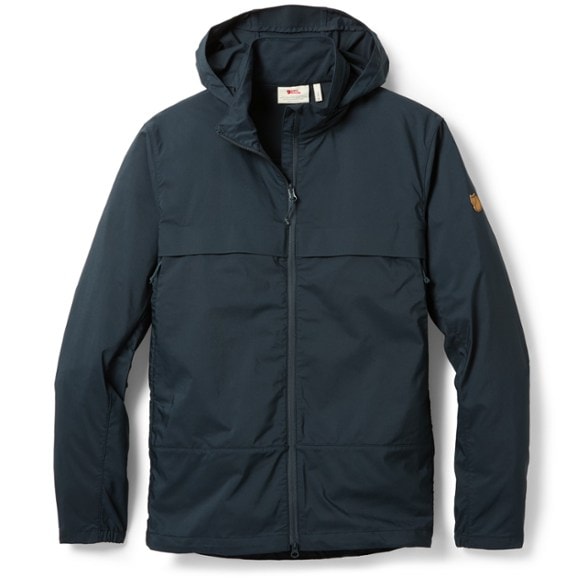 Front view of the packable men's hiking jacket in action on a trail.