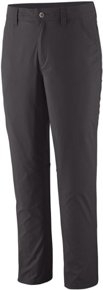 Side view of Patagonia women's Quandary pants during a hike, showcasing flexibility.